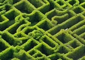 Understanding Ecommerce Revenue Attribution in Google Analytics 4 - supporting image of a maze
